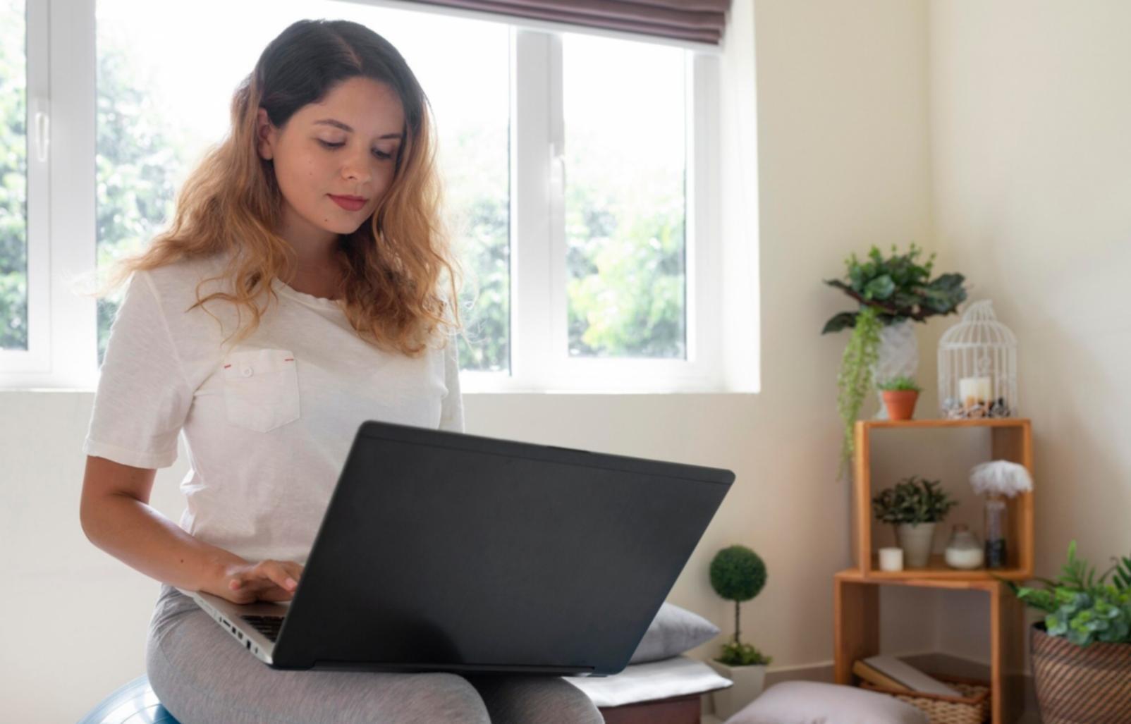 Person reviewing financial documents with focused concentration