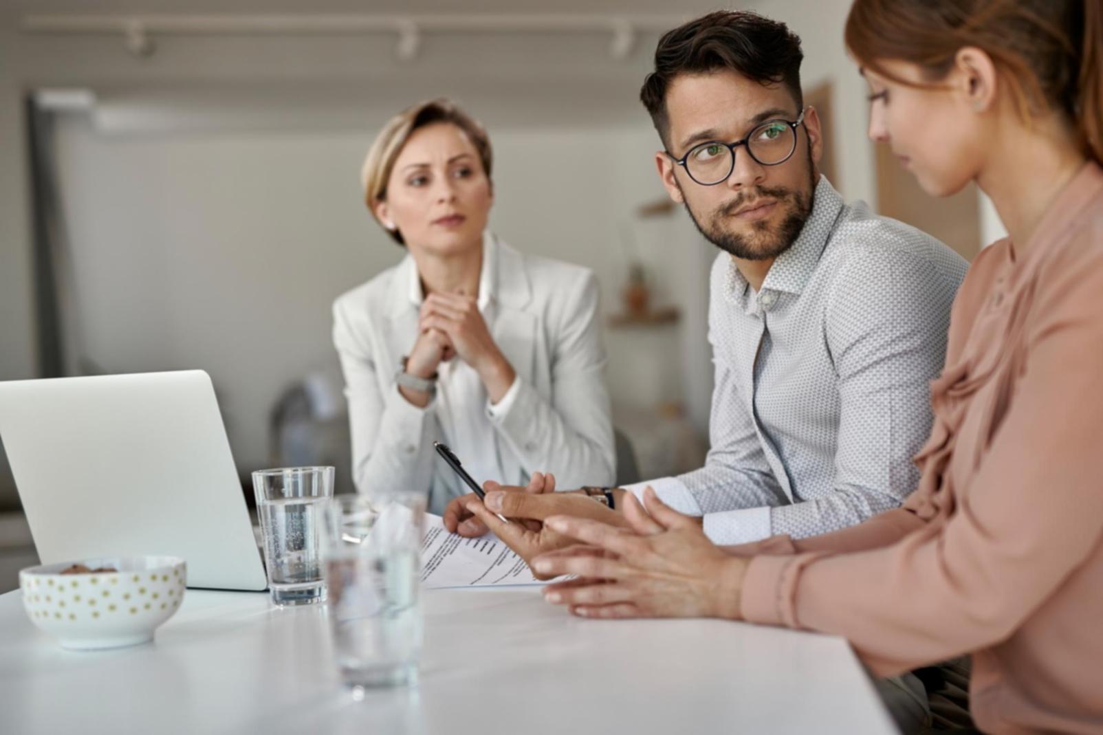 Modern workspace with financial planning materials and calculator