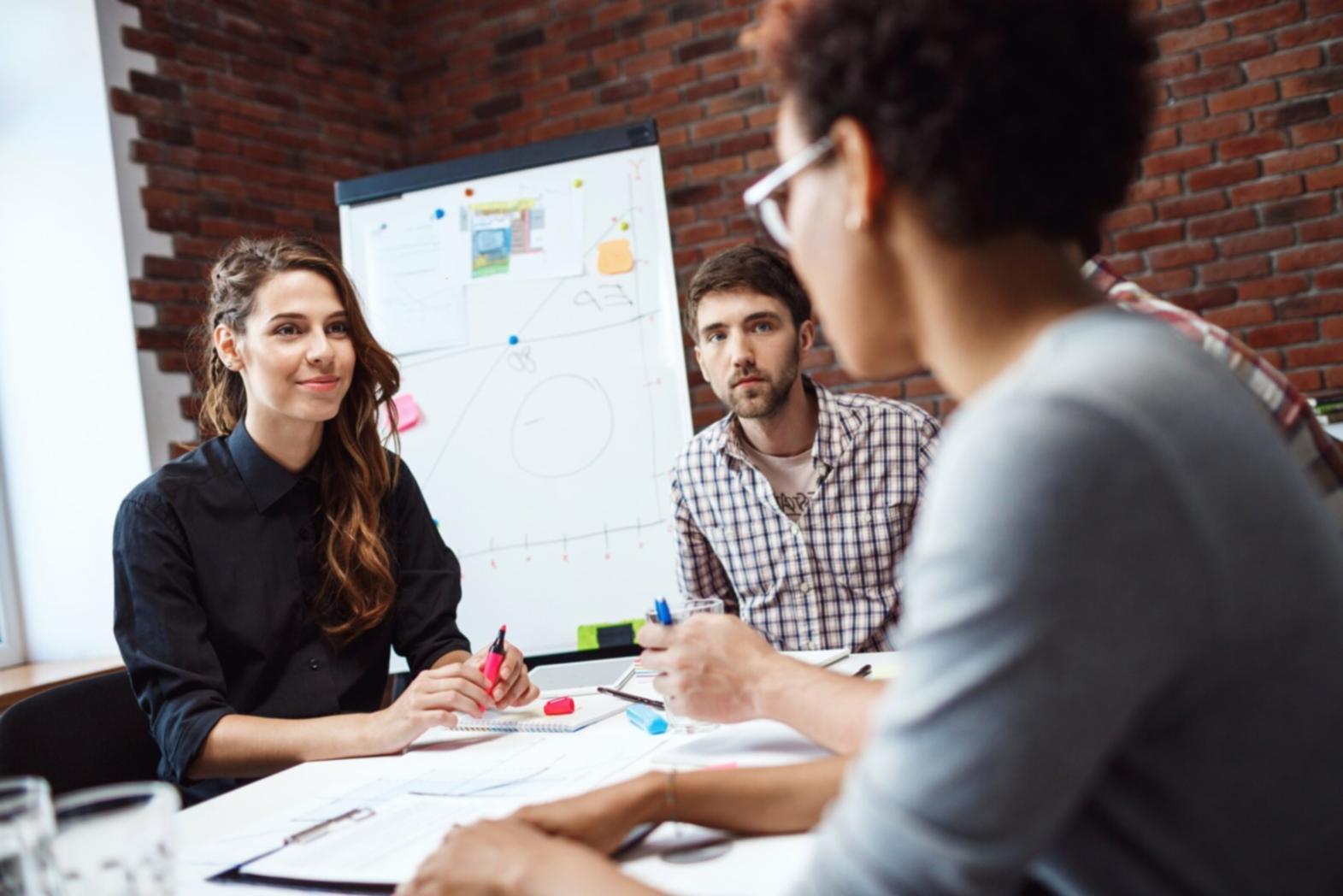 Clean organized desk setup with financial planning tools and natural lighting